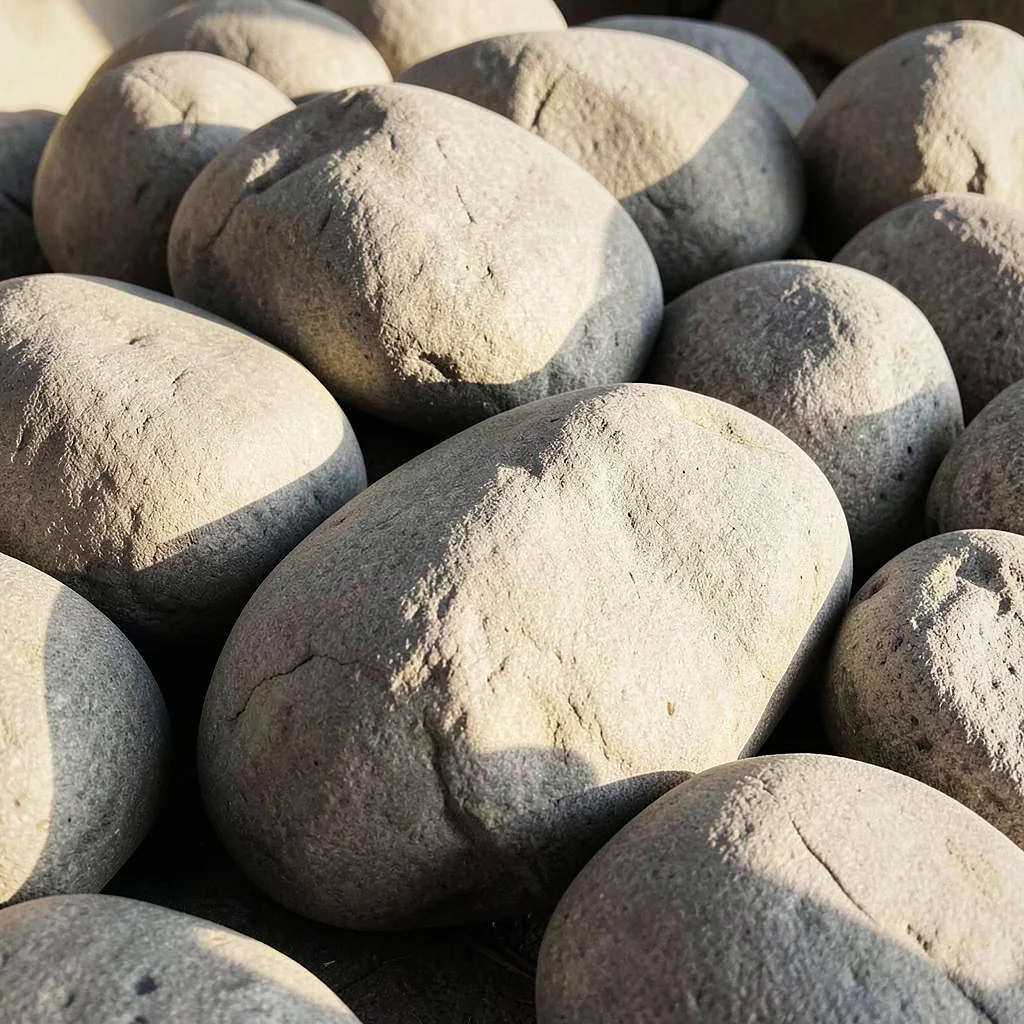 Sculptural grey stones set among the planting