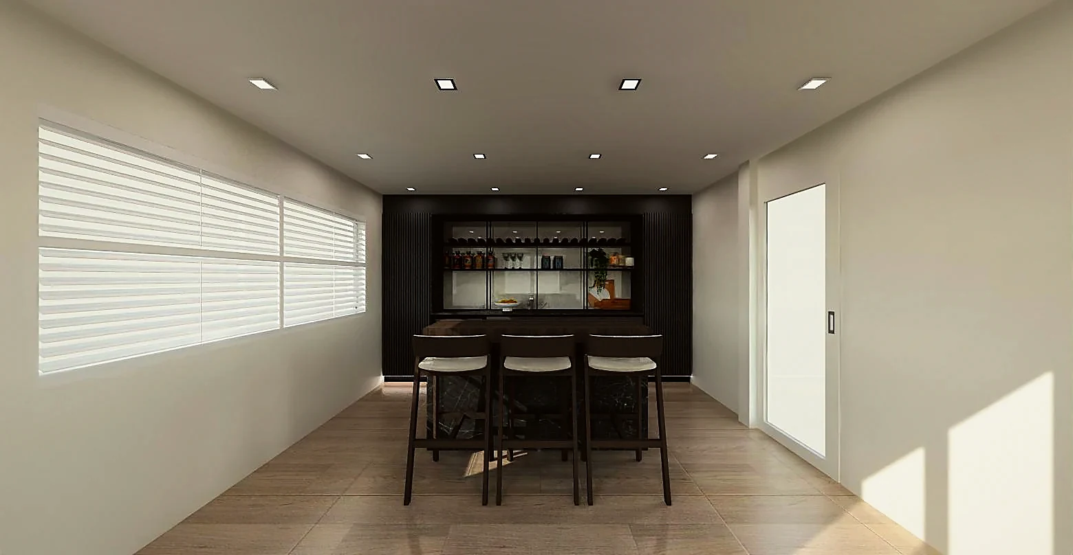 Kiara bar seen down the length of the room, stools at the counter
